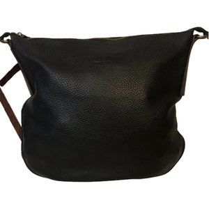 RUDSAK brand,  black and tan leather bag, like new